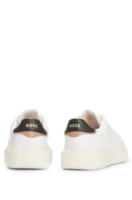 Deportivas de piel con cordones y detalles de logo